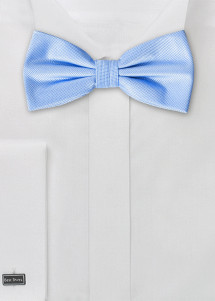 Effen vlinderdas met structuur in pastelblauw