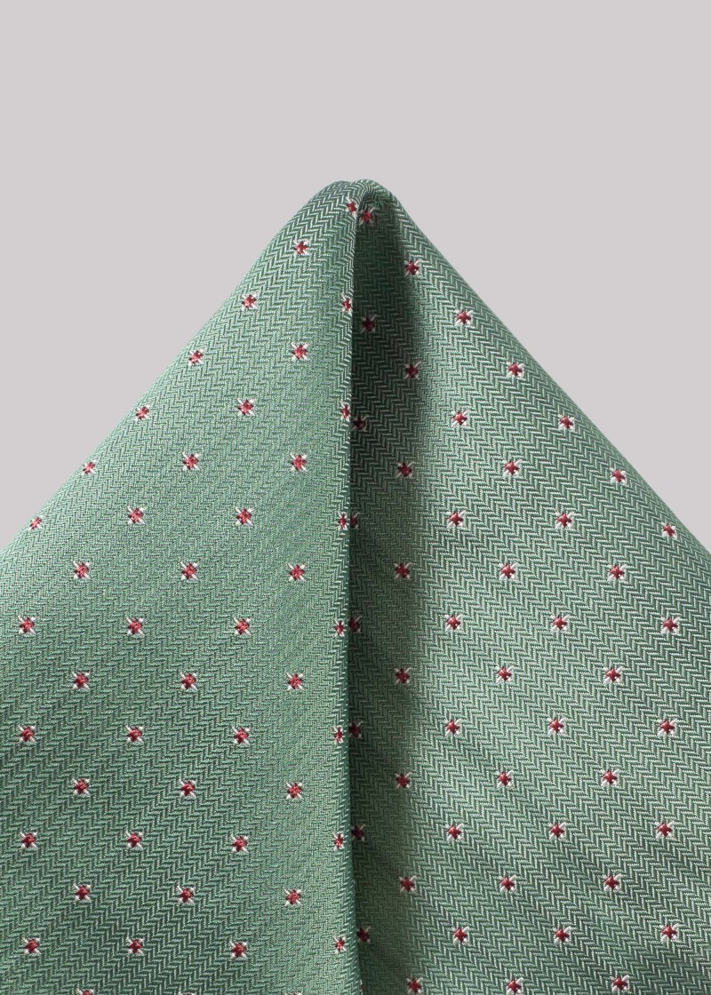 Lichtgroene pochette met patroon en fijne textuur
