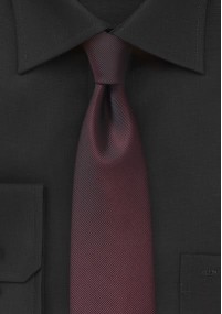 Smalle stropdas met licht geribbeld...