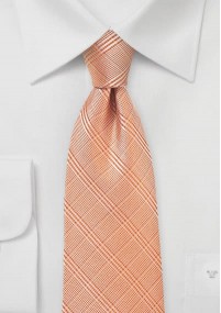 Opvallende geruite stropdas in een zalmkleur